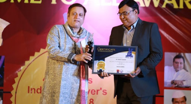 Medical Genius Award for Dental Implants Tourism India by Manoj Joshi, a well-known Indian film and television actor, presented the award.
